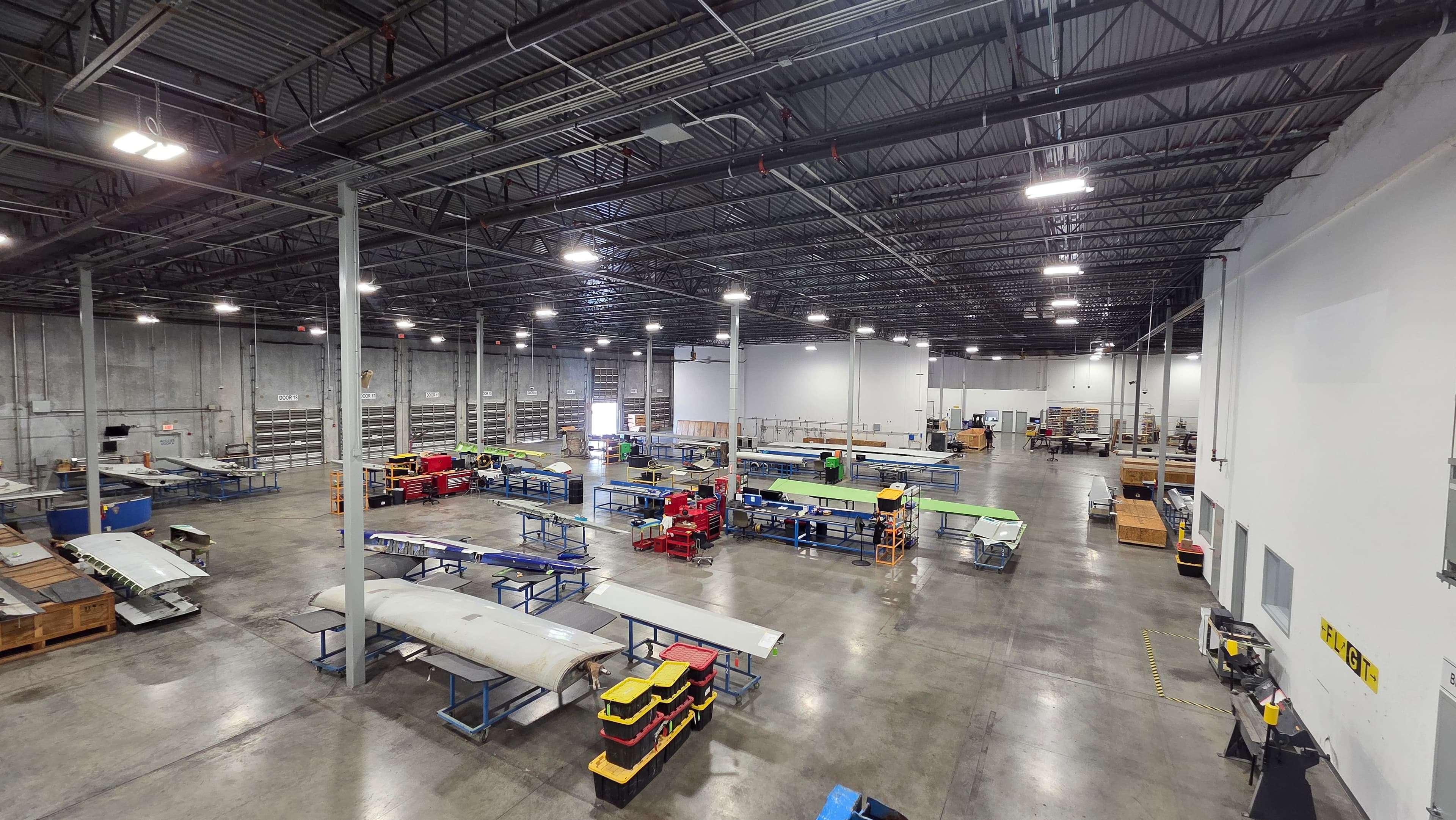 FLG Technics facility — overhead view of the shop floor